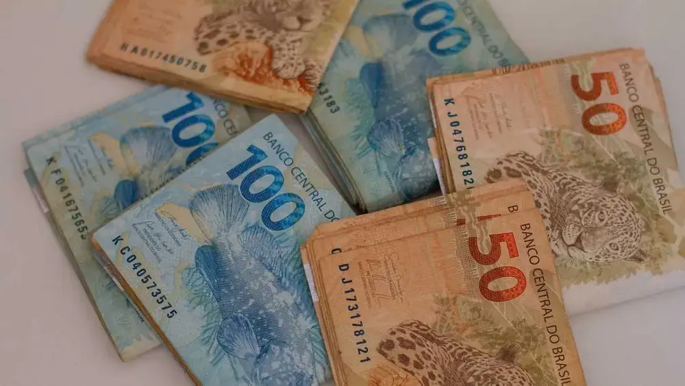 Como transferir investimentos de uma corretora para outra